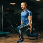 How To Do Walking Lunges With Dumbbell